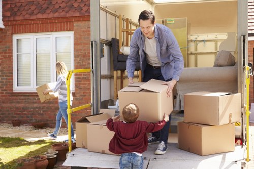 Professional movers handling furniture in Shoreditch