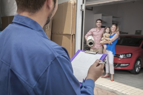 Professional movers handling furniture with care
